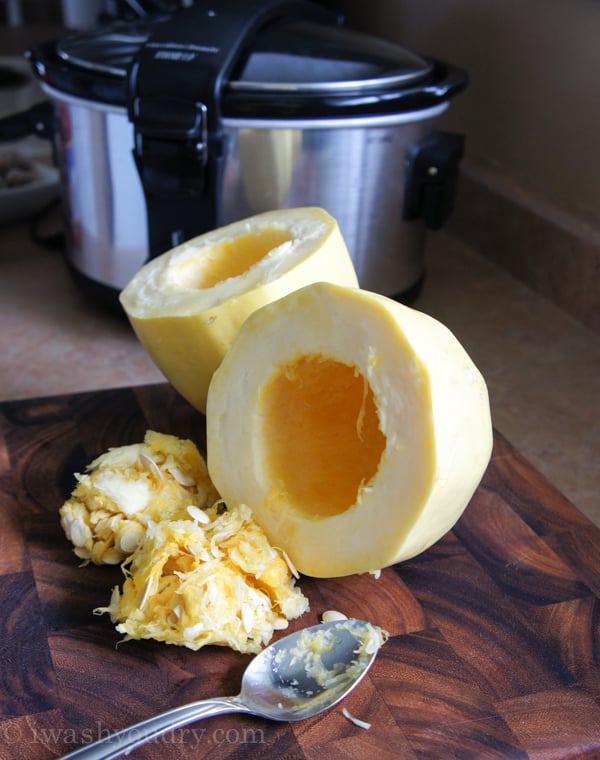 spooning membranes and seeds out of spaghetti squash.