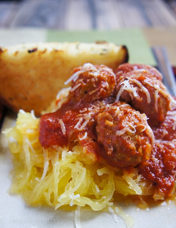 plate of spaghetti squash and meatballs wtih sauce.