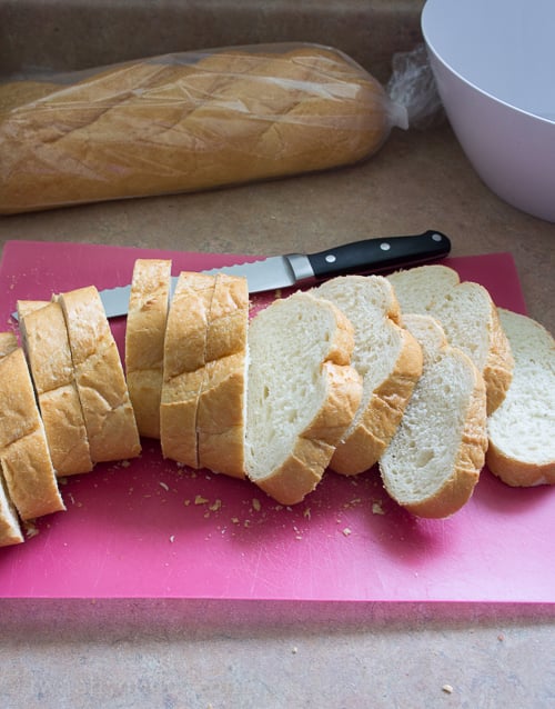 Crockpot Stuffing starts with crusty French bread. This recipe is perfect for Thanksgiving side dishes! 