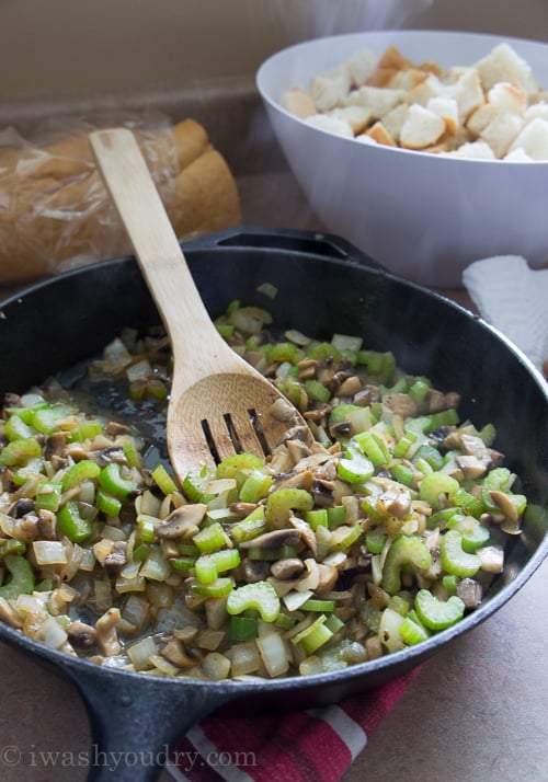 Sausage dressing is filled with diced vegetables then cooked in the crockpot.