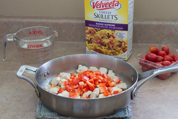 One Skillet Cheesy Chicken Nacho Casserole, ready in just 20 minutes for a quick and easy weeknight dinner! 