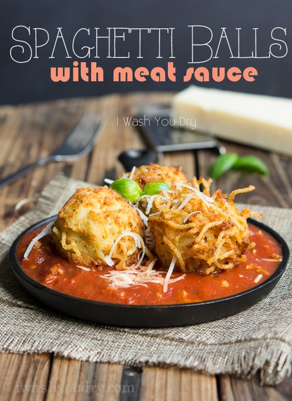 Spaghetti Balls with Meat Sauce! Spaghetti is combined with a cheesy mixture then formed into balls and fried until golden brown, then placed on top of a rich and hearty meat sauce.