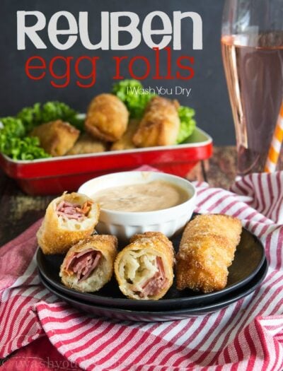 Reuben Egg Rolls are filled with corned beef, swiss cheese and sauerkraut, then served with a side of thousand island dressing! Ridiculously good!