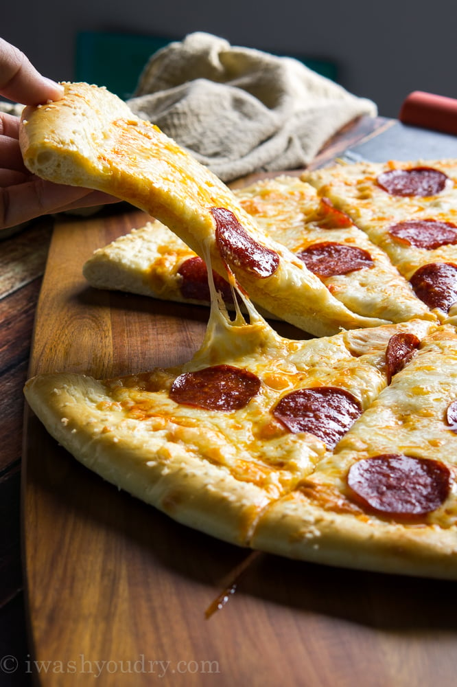 Pretzel Pizza!! The crust is made of soft pretzel dough, and then it's topped with nacho cheese sauce and the classic pepperoni and cheese toppings. It's out of this world!