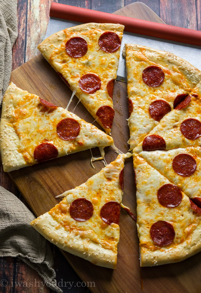 Pretzel Pizza!! The crust is made of soft pretzel dough, and then it's topped with nacho cheese sauce and the classic pepperoni and cheese toppings. It's out of this world!