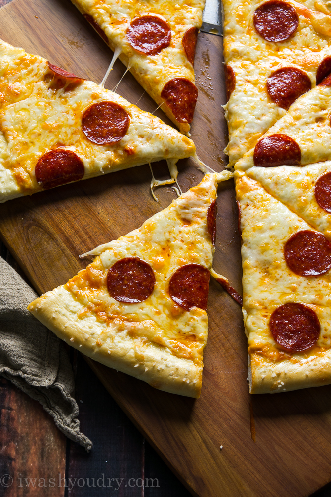 Pretzel Pizza!! The crust is made of soft pretzel dough, and then it's topped with nacho cheese sauce and the classic pepperoni and cheese toppings. It's out of this world!