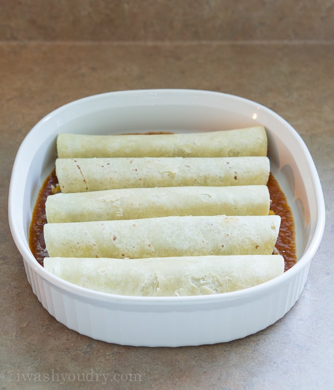 Sweet Pulled Pork Enchiladas with homemade enchilada sauce… these are to die for!! 