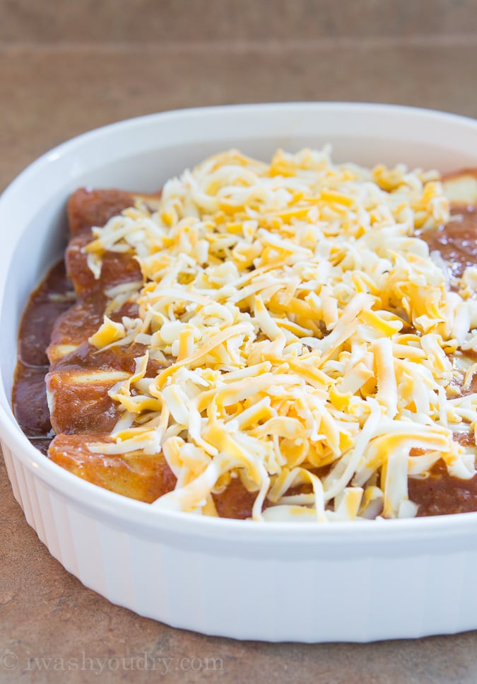 Sweet Pulled Pork Enchiladas with homemade enchilada sauce… these are to die for!! 