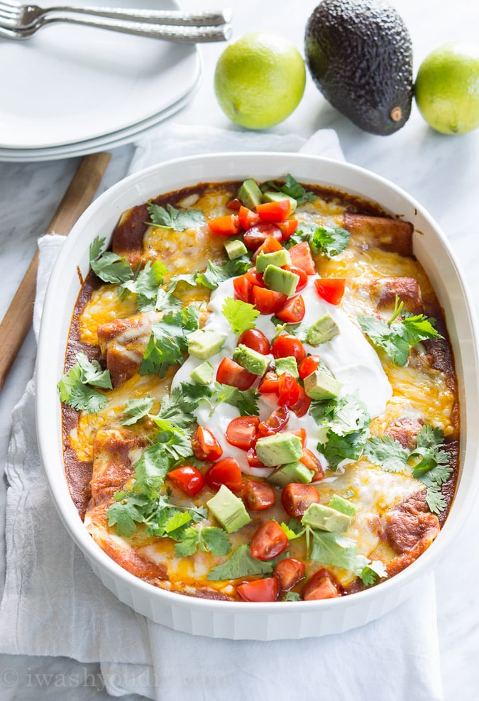 Sweet Pulled Pork Enchiladas with homemade enchilada sauce… these are to die for!! 