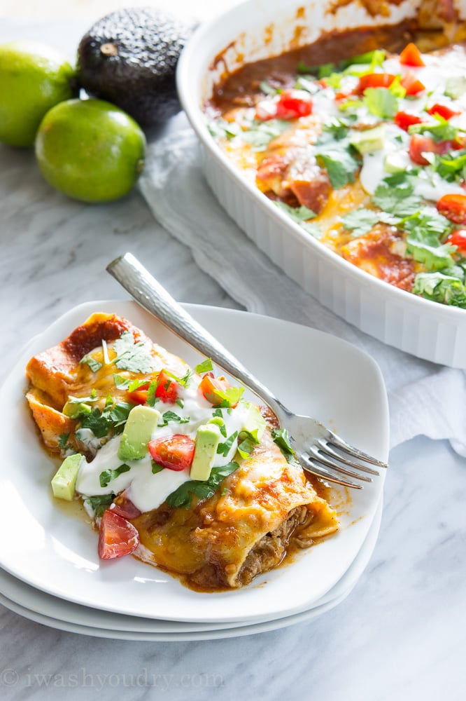 Sweet Pulled Pork Enchiladas with homemade enchilada sauce… these are to die for!! 