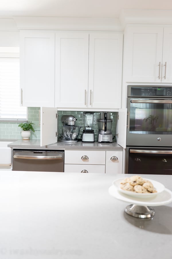 Store your small appliances on your countertop for easy access, but hide them behind cabinets to keep counters clean.