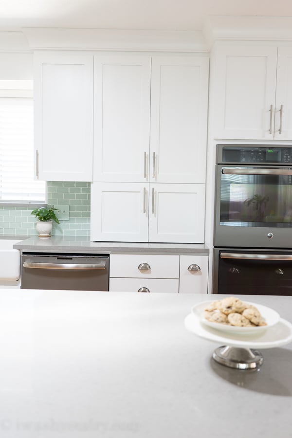 Store your small appliances on your countertop for easy access, but hide them behind cabinets to keep counters clean.