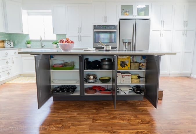 Secret Cabinet Storage under island for extra kitchen items you don't use daily! 