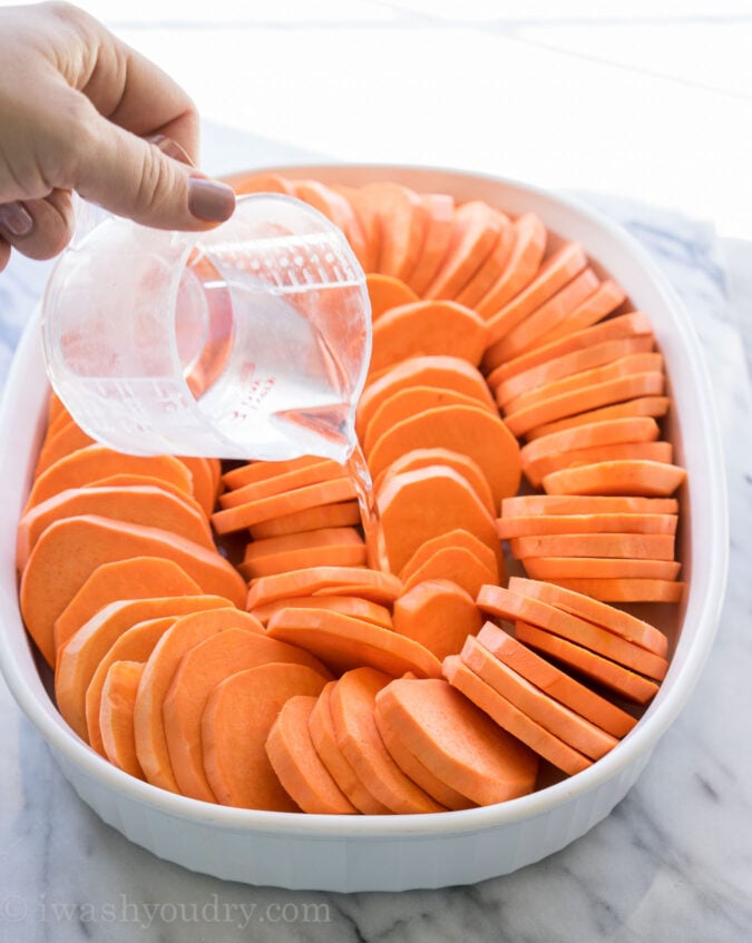 This No Boil Candied Sweet Potato Casserole is a crazy simple side dish recipe that's perfect for Thanksgiving or Christmas! I love this easy method of cooking the sweet potatoes! 