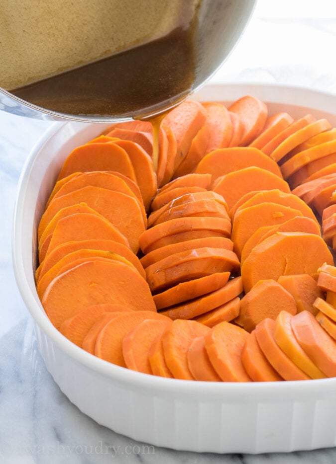 This No Boil Candied Sweet Potato Casserole is a crazy simple side dish recipe that's perfect for Thanksgiving or Christmas! I love this easy method of cooking the sweet potatoes! 