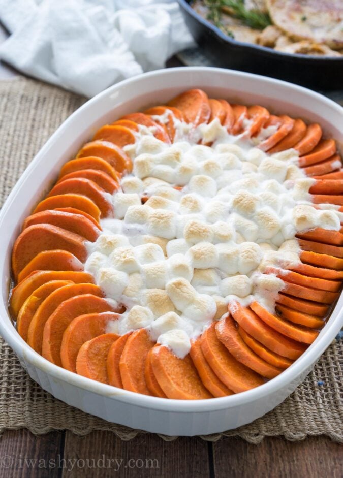 This No Boil Candied Sweet Potato Casserole is a crazy simple side dish recipe that's perfect for Thanksgiving or Christmas! I love this easy method of cooking the sweet potatoes! 