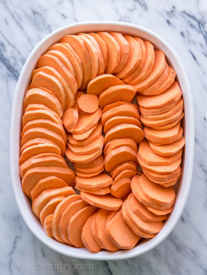 This No Boil Candied Sweet Potato Casserole is a crazy simple side dish recipe that's perfect for Thanksgiving or Christmas! I love this easy method of cooking the sweet potatoes! 