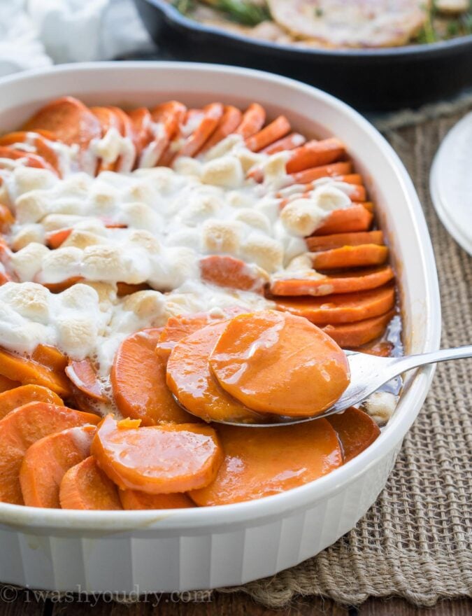 This No Boil Candied Sweet Potato Casserole is a crazy simple side dish recipe that's perfect for Thanksgiving or Christmas! I love this easy method of cooking the sweet potatoes! 