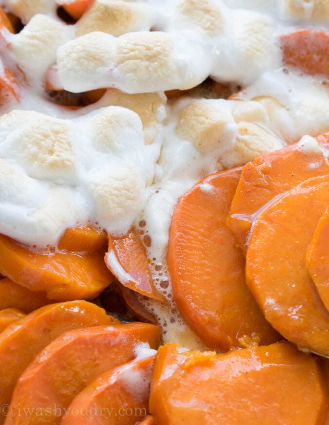 This No Boil Candied Sweet Potato Casserole is a crazy simple side dish recipe that's perfect for Thanksgiving or Christmas! I love this easy method of cooking the sweet potatoes! 