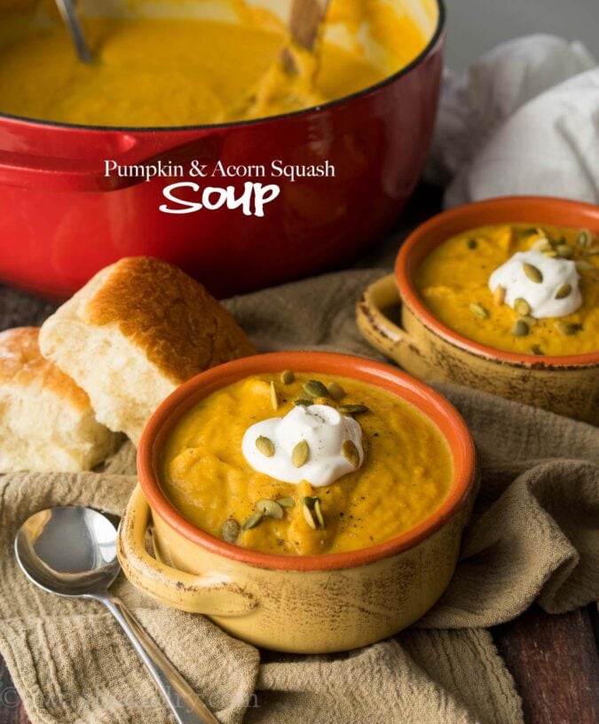 This Creamy Pumpkin and Acorn Squash Soup is the perfect recipe to warm up on a cold winter's night! I love the roasted pepitas on top!