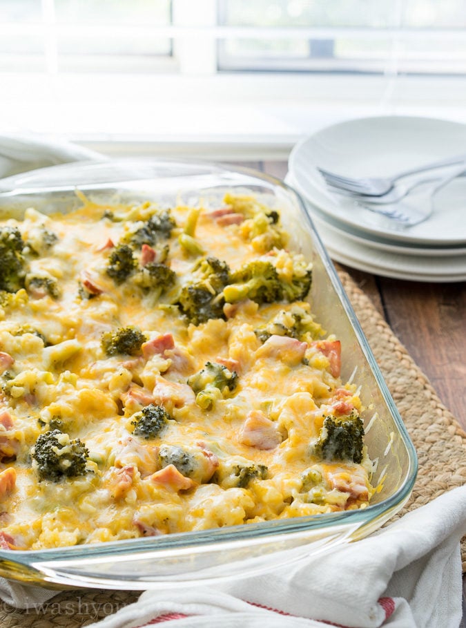 This Cheesy Leftover Ham and Rice Casserole recipe is a great way to use up some leftover Ham from the holidays! Plus you can easily substitute in leftover turkey or chicken too!