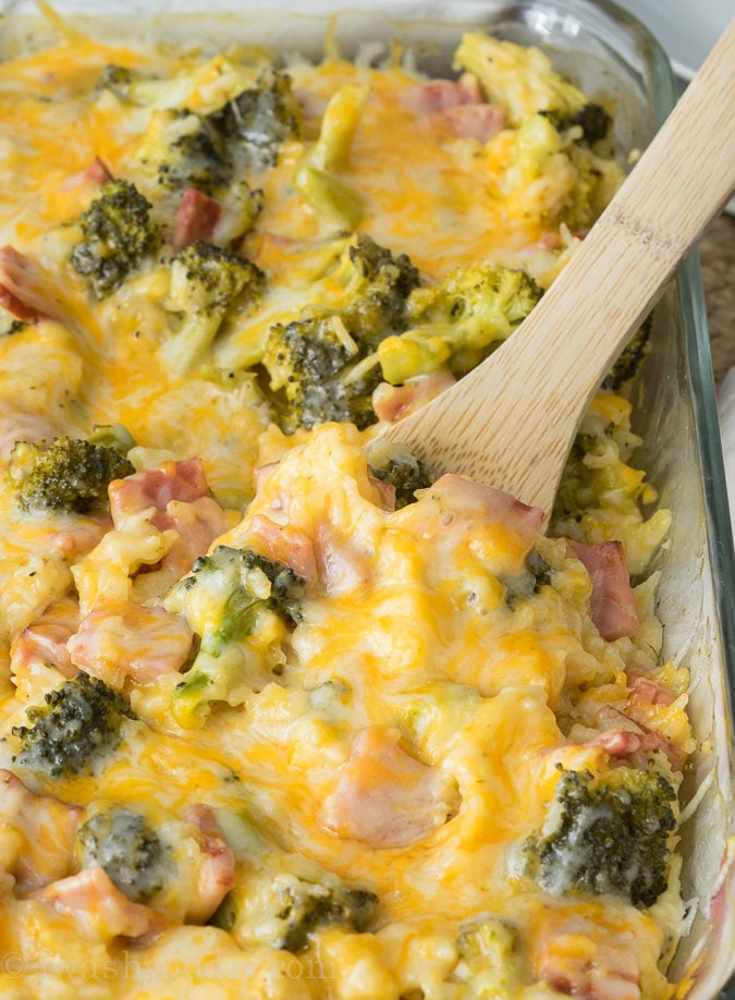 This Cheesy Leftover Ham and Rice Casserole recipe is a great way to use up some leftover Ham from the holidays! Plus you can easily substitute in leftover turkey or chicken too!