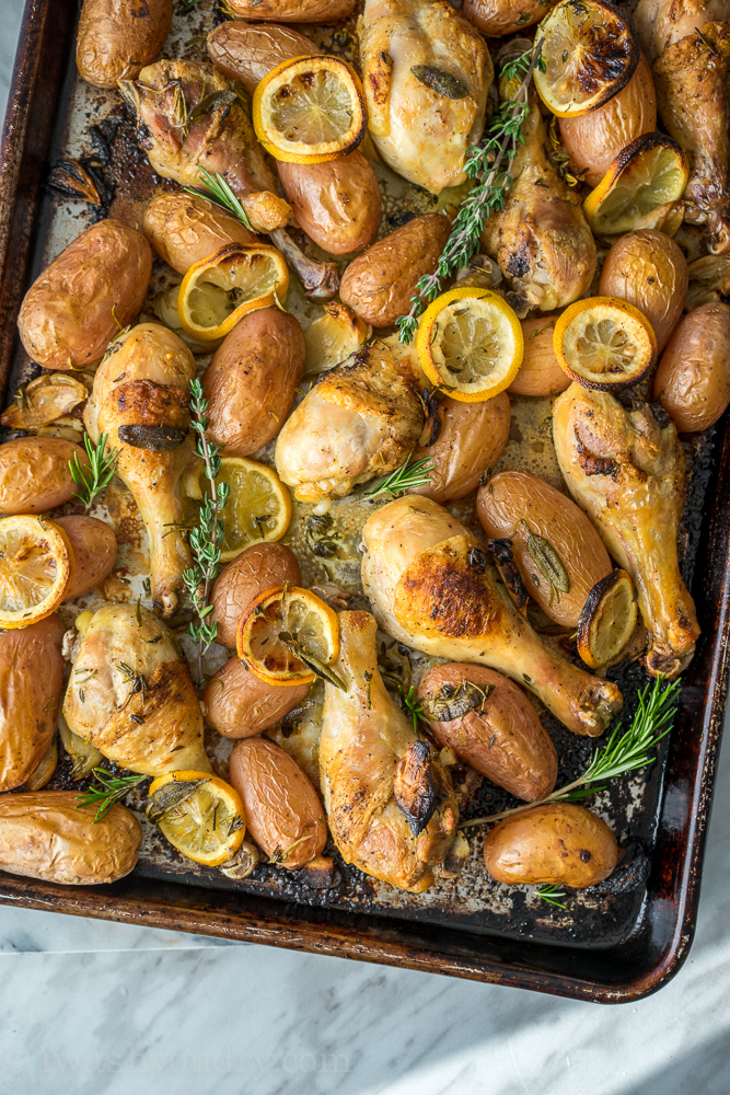 This super easy Lemon and Herb Roasted Chicken dinner recipe is a staple in our house. Everything is cooked in one pan for an easy weeknight dinner!