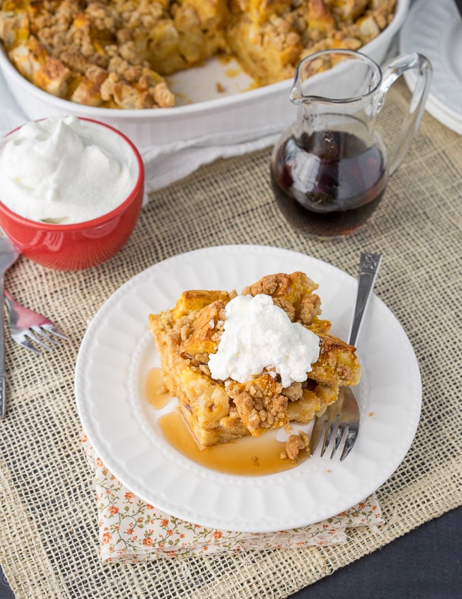 This Pumpkin French Toast Bake is filled with a delicious pumpkin pie flavor and topped with a gorgeous crumb topping. It's a family breakfast casserole type recipe that we can't get enough of! 