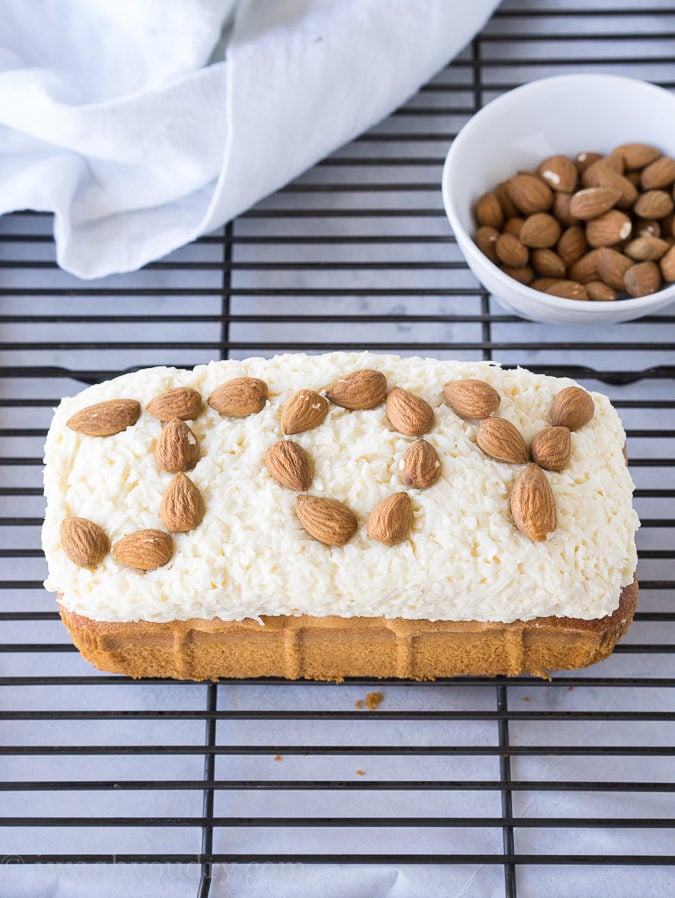 This Super Easy Almond Joy Pound Cake is almost too easy to make. I love how the almonds are put on! haha