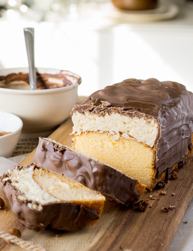 This Super Easy Almond Joy Pound Cake is almost too easy to make. I love how the almonds are put on! haha