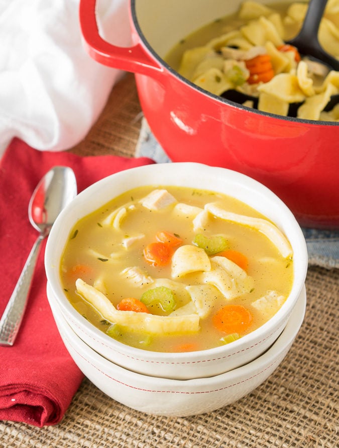 My family loves this Homemade Turkey Noodle Soup recipe! It's filled with homemade egg noodles (which are really easy to make), turkey (you can use chicken too), and lots of veggies!