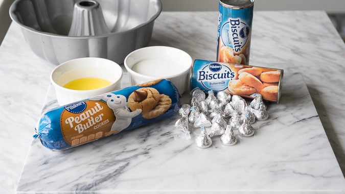 All the goodness of the classic peanut butter blossom, wrapped up in a warm and delicious monkey bread! My family loves this fun dessert recipe, but sometimes we even eat this for breakfast! 