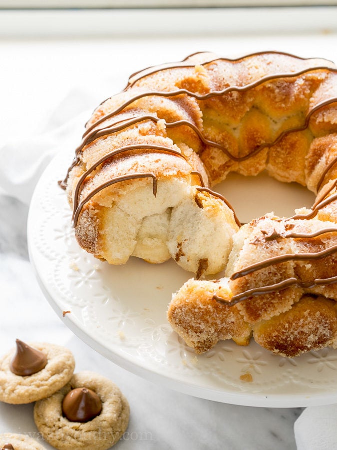 All the goodness of the classic peanut butter blossom, wrapped up in a warm and delicious monkey bread! My family loves this fun dessert recipe, but sometimes we even eat this for breakfast! 