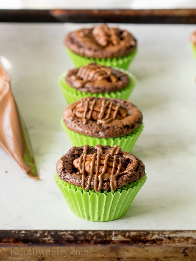 These Turtle Brownie Bites are ridiculously easy and taste so good! It's the filling on the inside that gets me every time! 