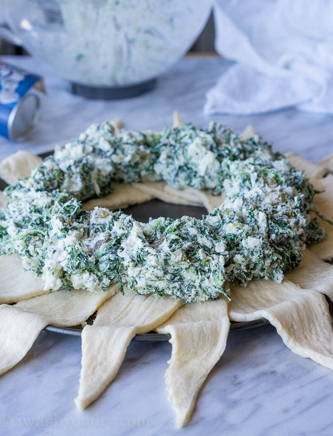 This Cheesy Spinach Jalapeño Crescent Ring is loaded with cream cheese, monterey jack cheese, spinach and diced pickled jalapeños. It's so easy to make and EVERYONE loves it! 