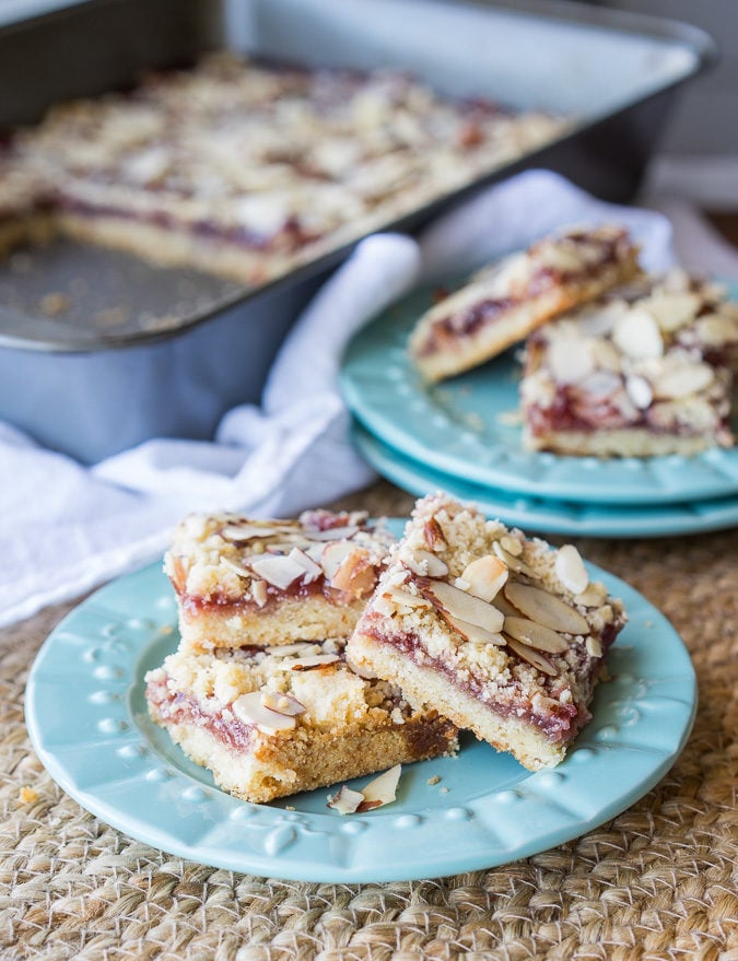 These soft and tender Raspberry Almond Bars have a shortbread cookie type crust and a wonderful almond flavor!
