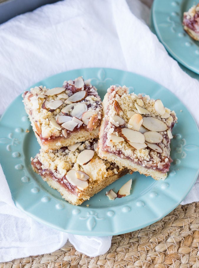 These soft and tender Raspberry Almond Bars have a shortbread cookie type crust and a wonderful almond flavor!