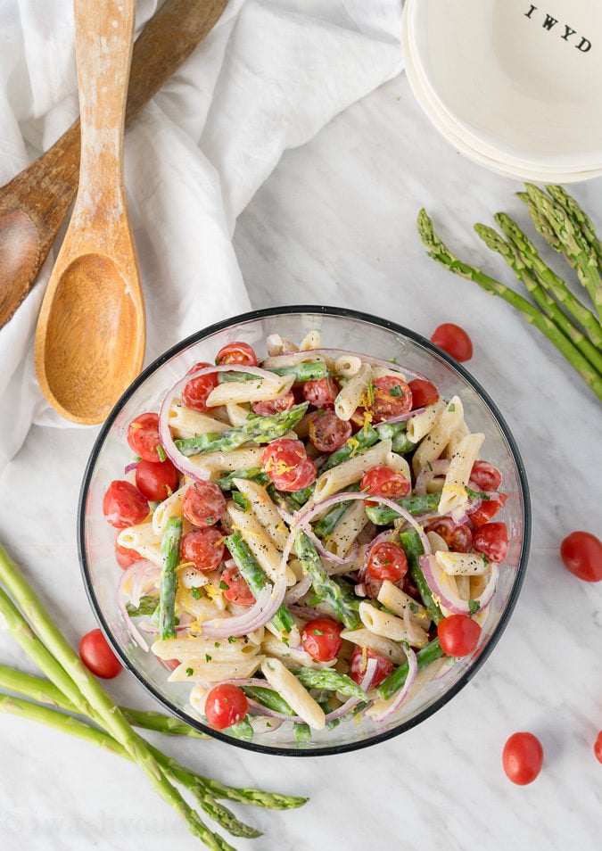 This Asparagus Pasta Salad is a cool and refreshing pasta salad that is bursting with flavors of lemon and parsley. Perfect spring salad!