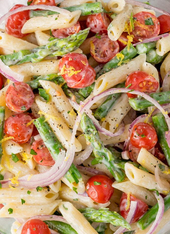 This Asparagus Pasta Salad is a cool and refreshing pasta salad that is bursting with flavors of lemon and parsley. Perfect spring salad!