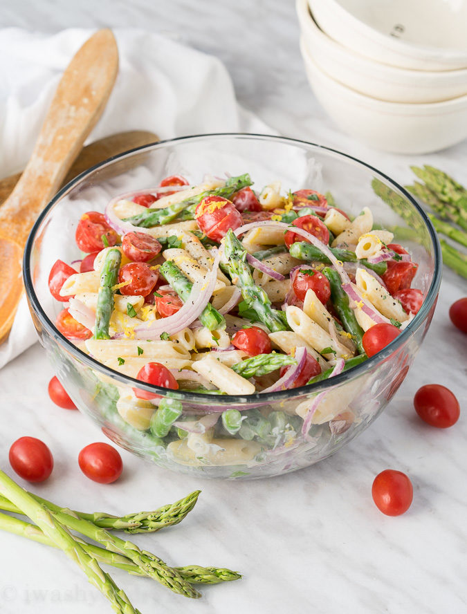 This Asparagus Pasta Salad is a cool and refreshing pasta salad that is bursting with flavors of lemon and parsley. Perfect spring salad!