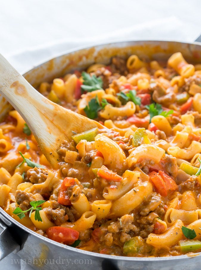 This Cheesy Sausage and Macaroni Skillet dinner recipe is super quick and easy, perfect for busy weeknights!