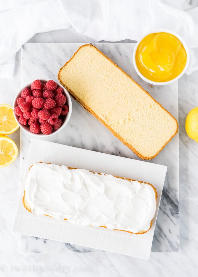 Come to mama! This Lemon Raspberry Stuffed Pound Cake is such an easy dessert recipe and tastes phenomenal! 