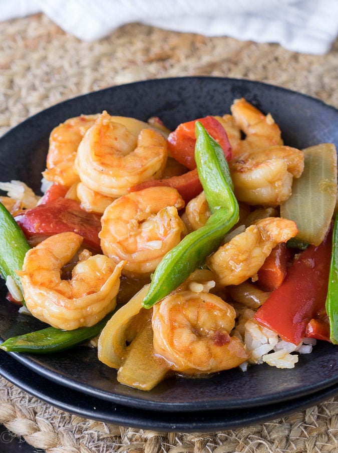 I'm in love with this Pacific Chili Shrimp Stir Fry. It tastes just like the popular new dish at Panda Express. Super quick and easy, my whole family loves it! 