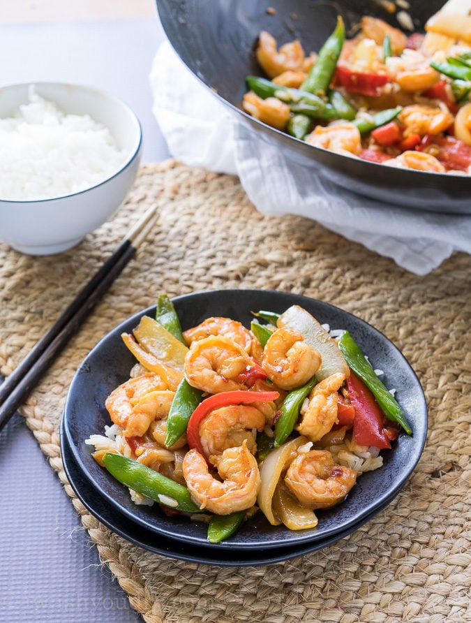 I'm in love with this Pacific Chili Shrimp Stir Fry. It tastes just like the popular new dish at Panda Express. Super quick and easy, my whole family loves it! 