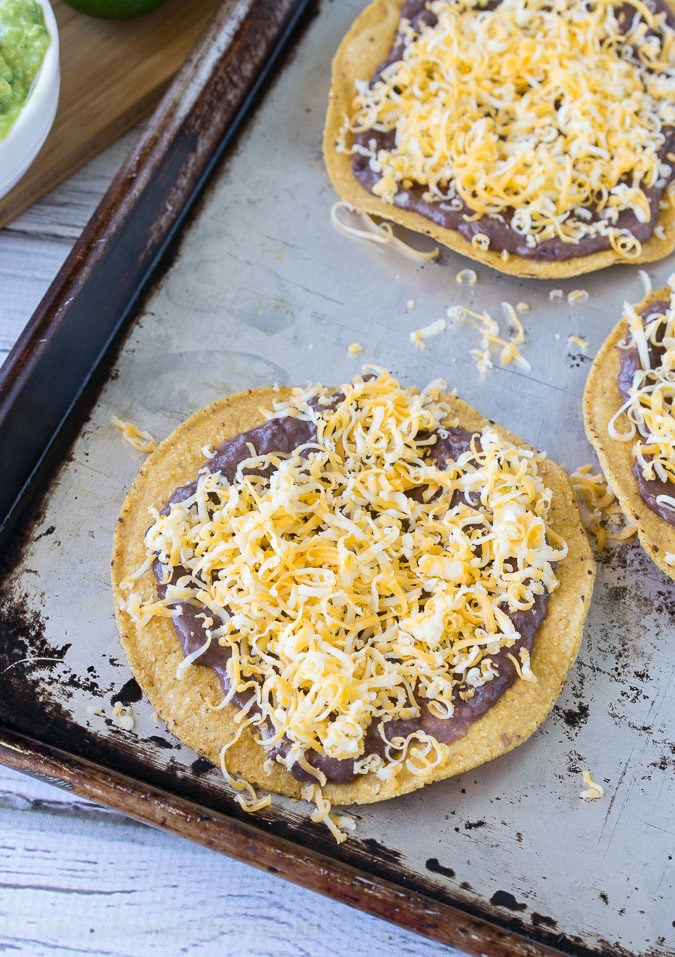 These Huevos Rancheros Tostadas with Avocado Salsa Verde are the ultimate breakfast, brunch or brinner recipe! Super quick and easy to make. My whole family loves these! 