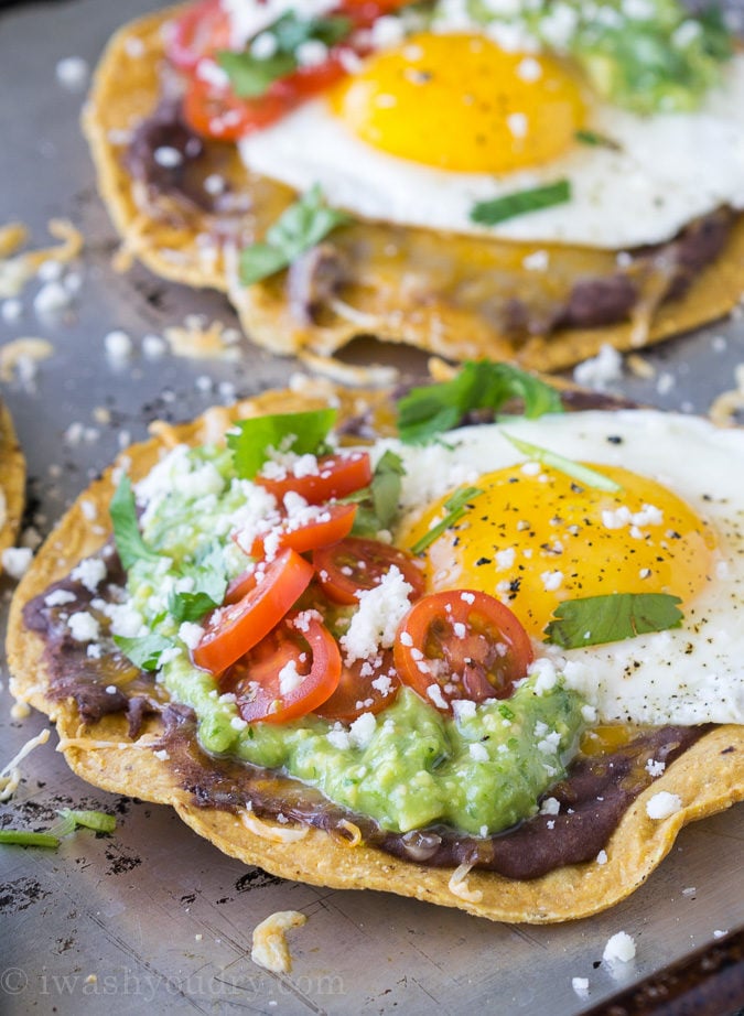 These Huevos Rancheros Tostadas with Avocado Salsa Verde are the ultimate breakfast, brunch or brinner recipe! Super quick and easy to make. My whole family loves these! 