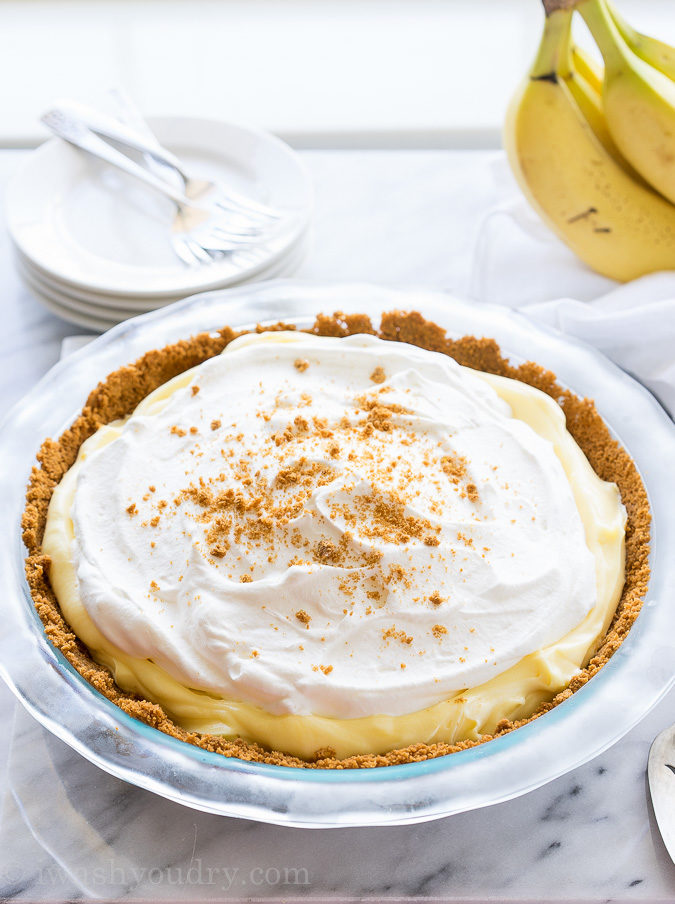 This Biscoff Banana Cream Pie has a biscoff cookie crust and is filled with a creamy banana pudding. It's a no bake pie that's perfect for summer!