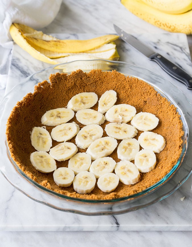 This Biscoff Banana Cream Pie has a biscoff cookie crust and is filled with a creamy banana pudding. It's a no bake pie that's perfect for summer!