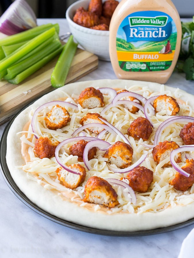 The combination of Buffalo Wings and Pizza in a creamy and cheesy Buffalo Ranch Chicken Pizza! So good with Hidden Valley's new Buffalo Ranch dressing! 