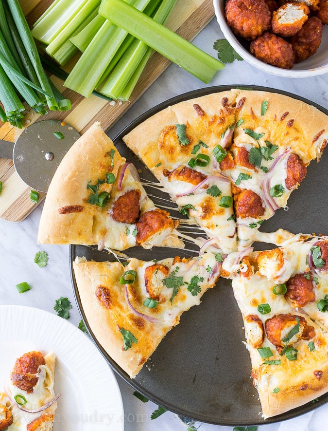 The combination of Buffalo Wings and Pizza in a creamy and cheesy Buffalo Ranch Chicken Pizza! So good with Hidden Valley's new Buffalo Ranch dressing! 